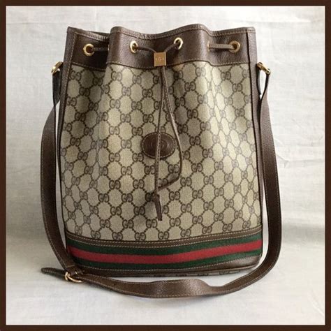 gucci drawstring bag replica|Gucci crossbody bucket bag.